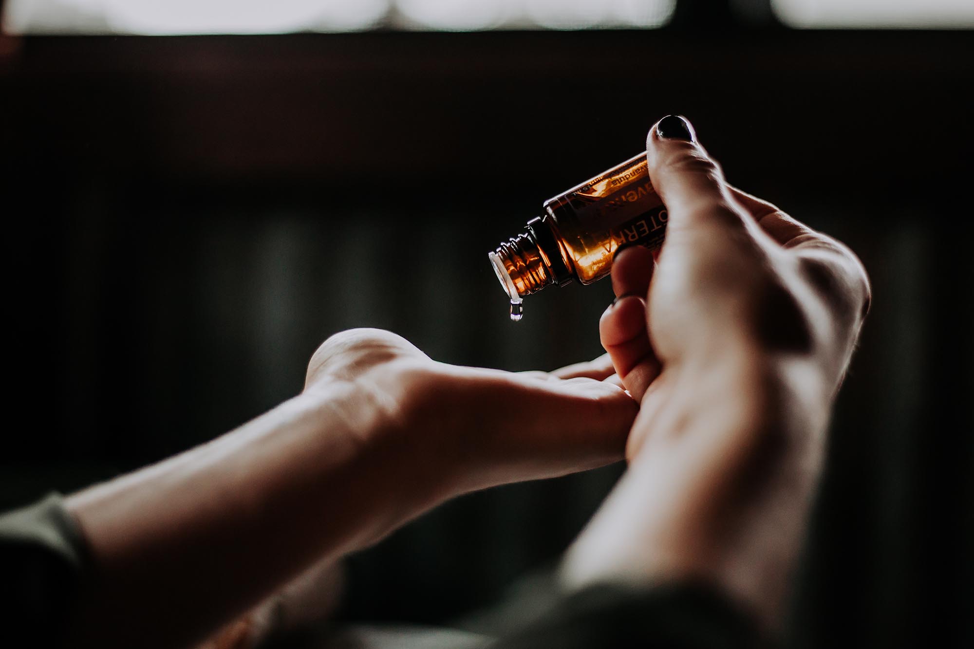 Photo hands and oil from San Pedro Today, Voices, Lori Garrett, Essential Oils (Photo by Unsplash)