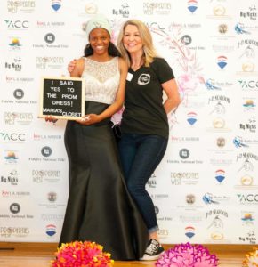 Photo of A local high school student says yes to her dress with Maria's Closet founder Ronna Luna (right) of San Pedro California. (photo: Mizzy Photography)