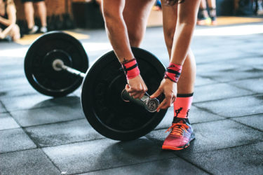 Photo of weight lifter in gym. (photo: unsplash)